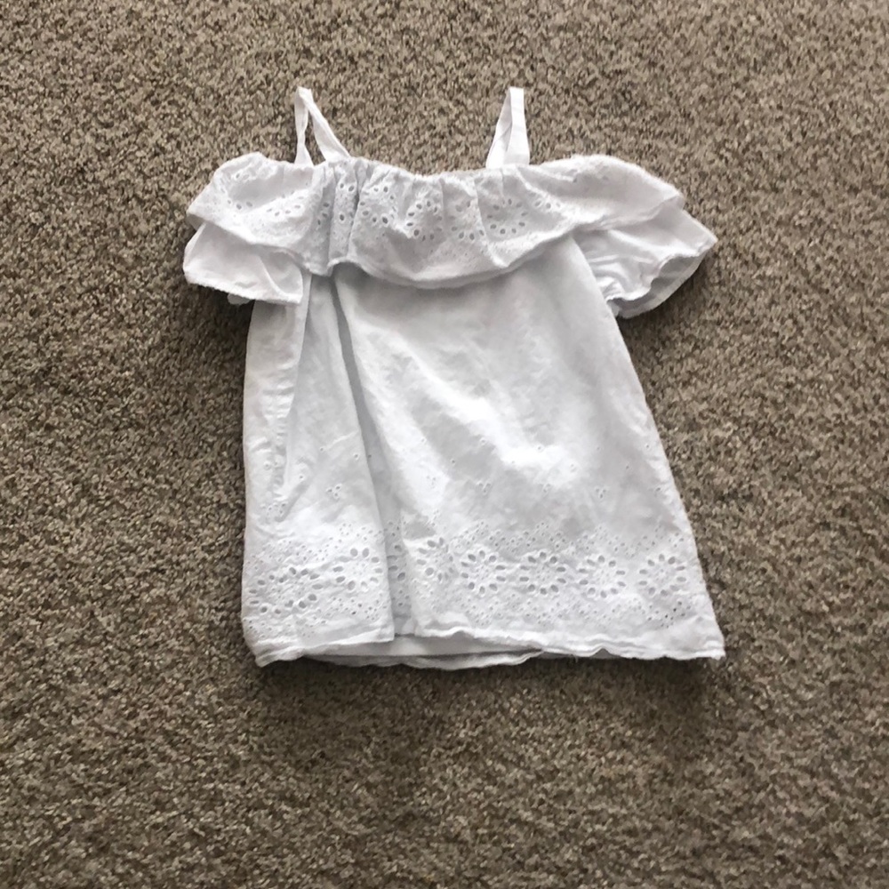 White top from Macy’s in a size medium.
